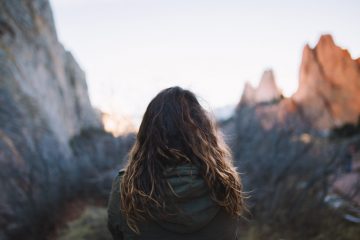 woman in front of mountain